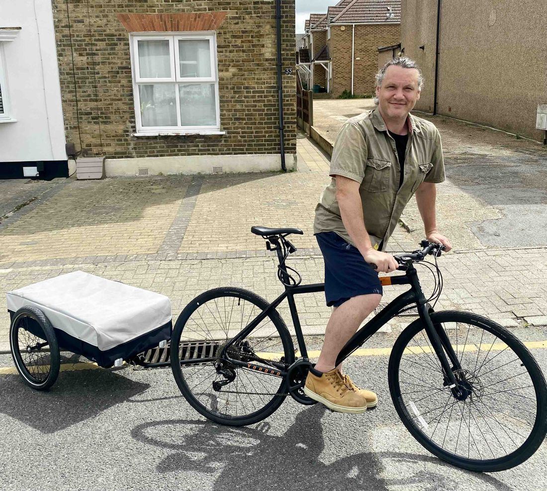 Charlie with his bicycle and cargo trailer in Bromley